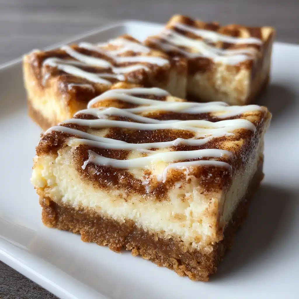 Ooey-Gooey Cinnamon Roll Cheesecake Bars Recipe - Recipe Image