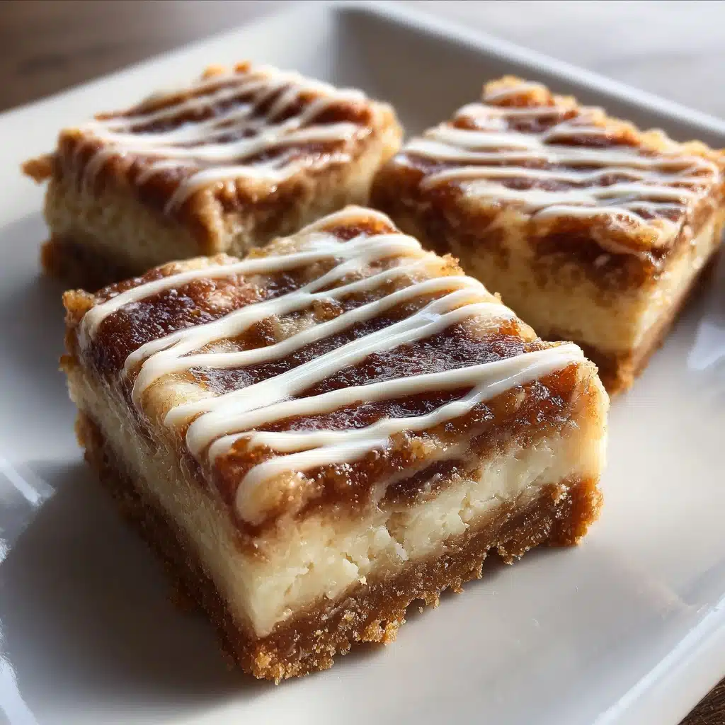 Ooey-Gooey Cinnamon Roll Cheesecake Bars Recipe - Recipe Image