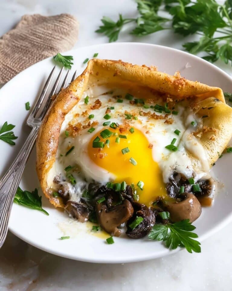 Savory Mushroom and Spinach Crepe Rolls with Baked Egg Recipe